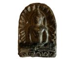 an image of a statue of a person sitting on a bench