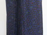 an image of a woman ' s dress on a mannequin stand
