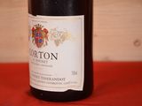 a bottle of wine that is sitting on a table
