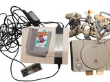 une console de jeux vidéo sur laquelle sont posées plusieurs manettes de jeux vidéo