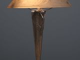 the lamp is sitting on a wooden table with a blue wall in the background