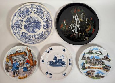 four plates that are sitting on a table