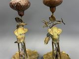 pair of antique brass candlesticks with flowers and leaves