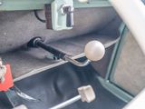 a close up of a car ' s interior with a steering wheel