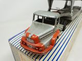 a toy truck that is sitting on top of a box