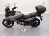 a motorcycle that is parked on the floor in a room