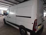 a white van that is parked inside of a building
