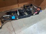 a picture of a car that is sitting in a garage