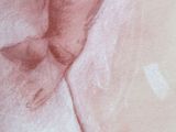 drawing of a baby in a diaper on a pink background