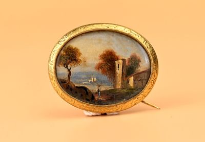 Broche ovale en métal doré centrée d'une miniature peinte so…
