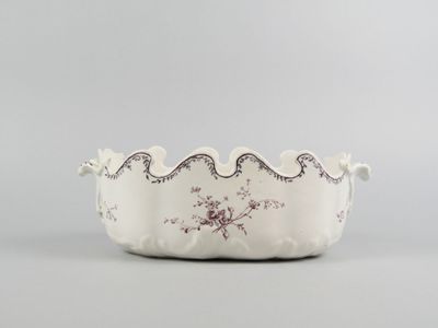 an image of a white bowl sitting on top of a table