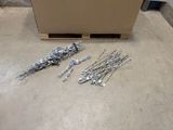 a bunch of tools sitting on the floor next to a box