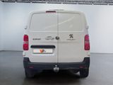 a white van that is parked inside of a building