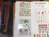 a lot of stamps on a table with a bunch of them