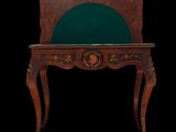 an antique desk with a green top and a wooden frame