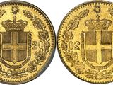 a gold coin with a crown and shield on it
