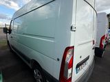 a white van that is parked in a parking lot