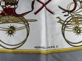 a scarf with a picture of a man riding a carriage