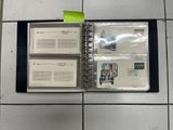 a binder that has a lot of papers in it