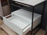 a white desk with two drawers and a drawer underneath it