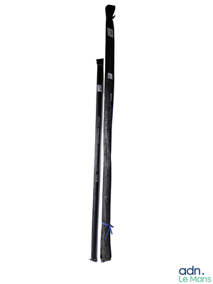 a pair of skis sitting next to each other on a white surface