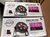 two boxes of lights that are sitting on a table