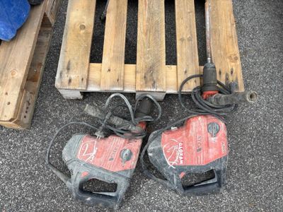 a pair of shoes that are on the ground next to a pallet