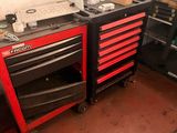 two red and black drawers and a black and red tool cabinet