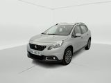 a silver car is parked in a white room with a white floor
