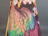 an image of a colorful bird scarf on a mannequin