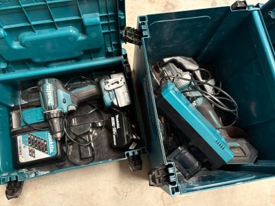 two tools in a blue box on the floor