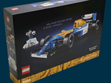 a box that has a lego race car in it