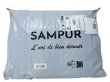 a bag of sampurr sitting on top of a white surface