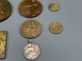 a lot of coins that are sitting on a table