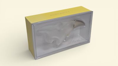an image of a box with a knife in it on a white surface