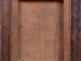 an old wooden picture frame with a brown stain on it