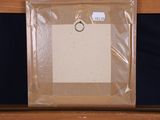 a picture of a picture of a ring on a piece of paper