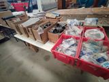 many boxes of assorted items sitting on a table