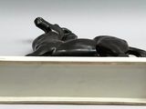 statue of a man laying on his back in a box