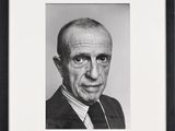 black and white photograph of a man in a suit and tie