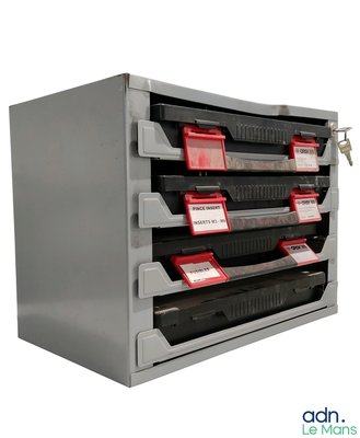 an image of a metal filing cabinet with red labels on it