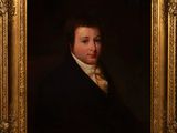 portrait d'un homme en costume noir et chemise blanche