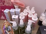 a lot of baby bottles and bottles on a table
