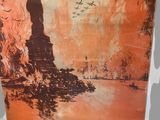 an old poster of a statue of liberty on display in a museum