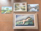 three framed paintings of a woman laying on a bed next to a river