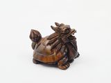 an image of a statue of a turtle on a white surface