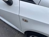 a close up of a car door handle on the side of the car