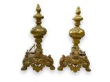 pair of antique brass candlesticks with ornate design