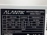 a close up of a power supply label on a white wall