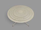 an image of a white table with a circular design on it